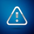 Silver Exclamation mark in triangle icon isolated on blue background. Hazard warning sign, careful, attention, danger Royalty Free Stock Photo