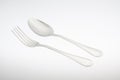 Silver fork with spoon isolated on white background Royalty Free Stock Photo