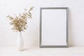 Silver frame mockup with decorative dried grass