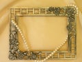 Silver frame and pearls Royalty Free Stock Photo