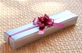 Silver gift box with pink bow Royalty Free Stock Photo