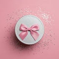 Silver Gift Box with Pink Bow on Pink Background Royalty Free Stock Photo