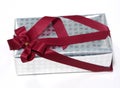 Silver Gift box rose texture with red ribbon, Isolated.