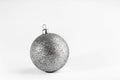 Silver glitter Christmas ball isolated on a white background Royalty Free Stock Photo