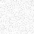 Silver glitter stars falling from the sky on white background. A Royalty Free Stock Photo