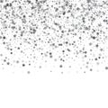 Silver glitter stars falling from the sky on white background. A Royalty Free Stock Photo