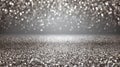 Silver glitter surface with soft bokeh lights creating bright festive abstract background Royalty Free Stock Photo