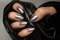 Silver glittered nails manicure