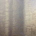 Silver and gold crinkled wallpaper texture with abstract pattern