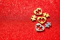 Silver and Gold Hearts with Matching Puzzle Pieces on Red Royalty Free Stock Photo