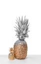 Silver and gold painted pineapple with cute decor