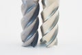 Silver and golden end mill cutter Royalty Free Stock Photo