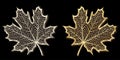 Silver and golden hand-made maple leaves