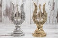 Silver and Golden Religious Statuettes with the Names of Allah Royalty Free Stock Photo