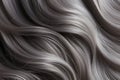 Silver grey wavy long shiny hair texture, gray aged hair background.