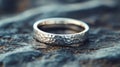 Silver Hammered Metal Wedding Band Ring Royalty Free Stock Photo