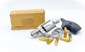 silver hammerless 357 magnum revolver gun .38 caliber special with full metal cartridge ammo ammunition. Self defense weapon for