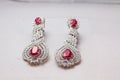 Silver handmade earings with big red rubies Royalty Free Stock Photo