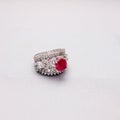 Silver handmade ring with diamonds and a red ruby Royalty Free Stock Photo