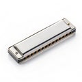 Silver harmonica on white background Royalty Free Stock Photo