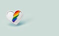Silver heart with rainbow lightning inside. LGBT love and fight for their rights symbol concept. on pastel green