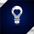 Silver Heart shape in a light bulb icon isolated on dark blue background. Love symbol. Valentine day symbol. Vector Royalty Free Stock Photo