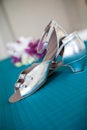 Silver high heeled shoes