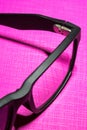 Silver hinge of the black plastic eye-wear or eye-glasses isolat