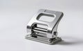 Silver hole puncher with clean lines, perfect for document management. Royalty Free Stock Photo