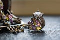 Silver jewelry with colored stones-cubic Zirconia of different colors, delicate shades. Jewelry pink, green, yellow and lilac. Rhi Royalty Free Stock Photo