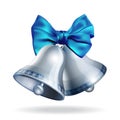 Silver jingle bells with blue bow isolated on white. Royalty Free Stock Photo