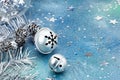 Silver jingle bells with christmas tree branches and decoration