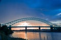 Silver Jubilee Bridge in Runcorn with the sun setting in the background Royalty Free Stock Photo