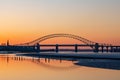 Silver Jubilee Bridge in Runcorn with the sun setting in the background Royalty Free Stock Photo