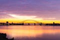 Silver Jubilee Bridge in Runcorn with the sun setting in the background Royalty Free Stock Photo