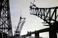The Silver Jubilee Bridge under construction in the late 1950s in Runcorn, Cheshire Royalty Free Stock Photo