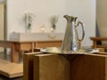 Silver jug and plate in Arctic Cathedral in Tromso, Norway Royalty Free Stock Photo