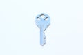 Silver key close-up isolated Royalty Free Stock Photo