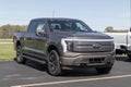 Ford F-150 Lightning display. Ford offers the F150 Lightning all-electric truck in Pro, XLT, Lariat, and Platinum models Royalty Free Stock Photo