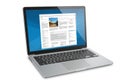 Silver laptop with a chrome finish displaying a website open in a Royalty Free Stock Photo