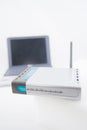 Silver Laptop and wireless router