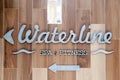 Silver letters, pointer of waterline, spa, fitness sign on the wall hotel, lobby. Concept sign, cursor, inscription of spa at the Royalty Free Stock Photo