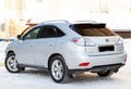 Silver Lexus RX450h 2009 release with an hybrid engine of 3.5 liters rear view on the car snow parking after preparing for sale
