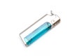 A silver lighter with blue translucent fuel space Royalty Free Stock Photo