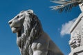 Silver Lion Sculpture and Blue Sky in background