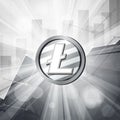 Silver litecoin coin cryptocurrency in bright rays with stat Royalty Free Stock Photo