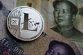 Silver Litecoin LTC on Chinese Yuan banknote