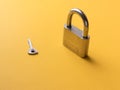 Silver lock with key stock image.