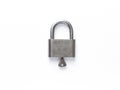 Silver lock with key stock image.