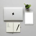 Silver MacBook closed on a gray Royalty Free Stock Photo